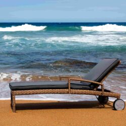 All weather outdoor pool loungers with cushions for outdoor poolside areas