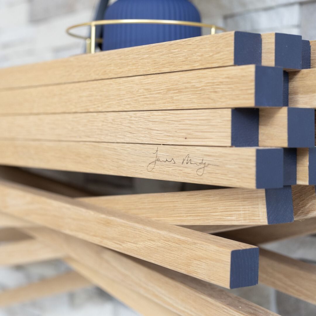 Interior design featuring bespoke furniture and a striking feature art piece for a personalized living space.